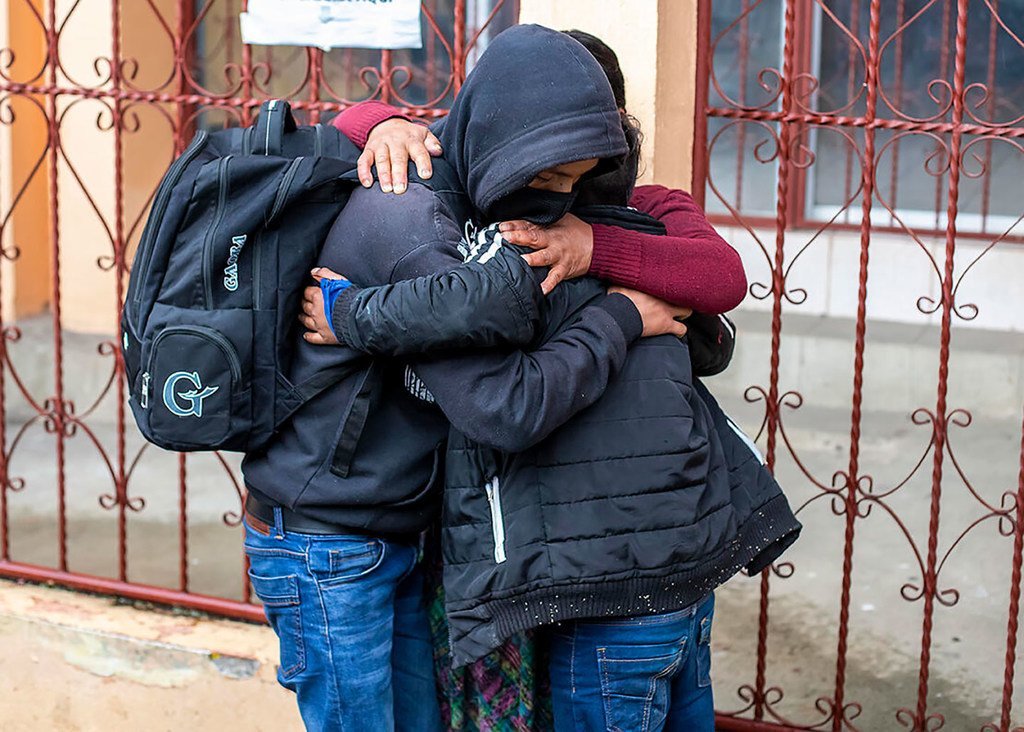 An adolescent boy reunites with his family in Guatemala after being deported back from the United States. (file)